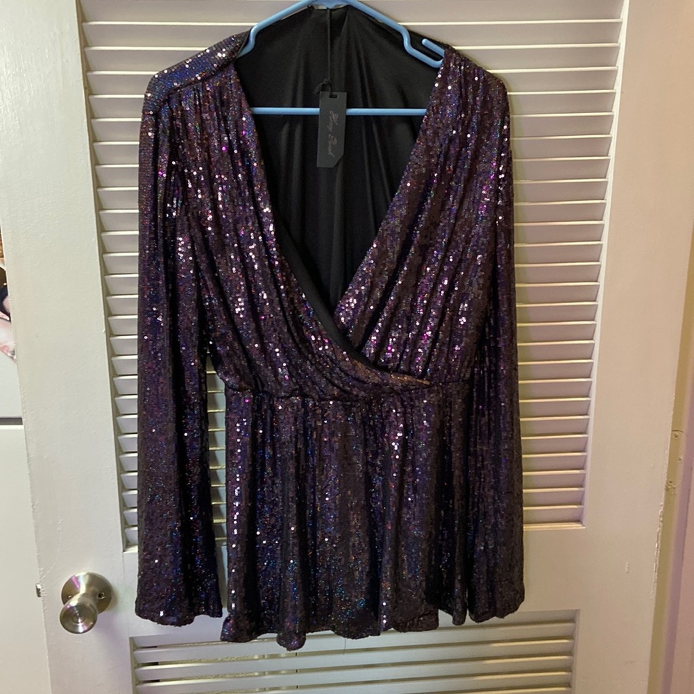 Long sleeved, purple sequins romper. Large.